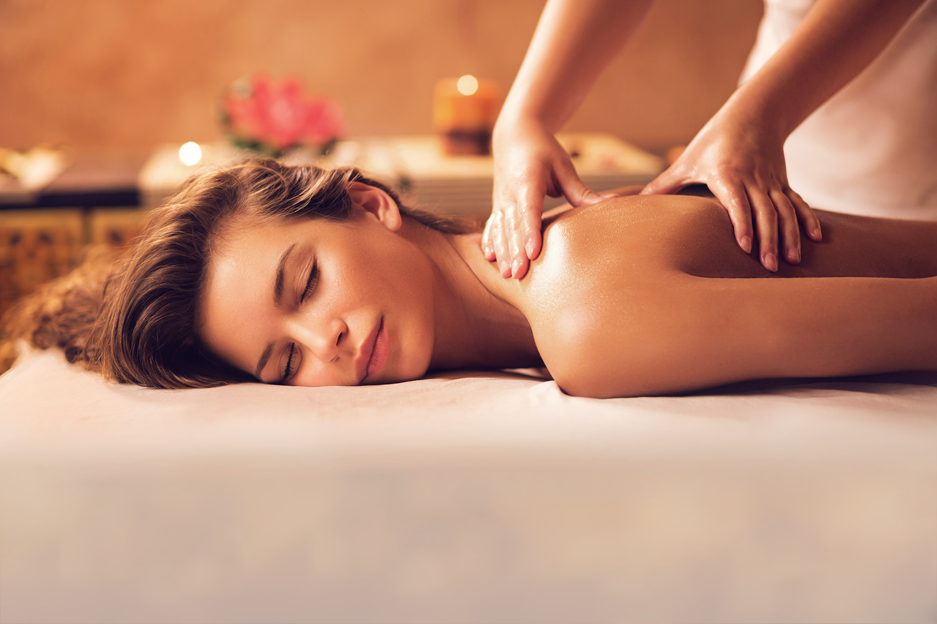 Young-woman-relaxing-during-back-massage-at-the-spa.-469916170_5760x3840.jpg